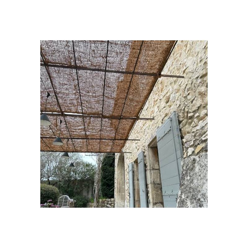 Toile coco avec renforts pour une pergola dans le sud de la France