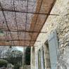 Toile coco avec renforts pour une pergola dans le sud de la France