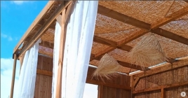 Coconut fibre cover for wooden pergola